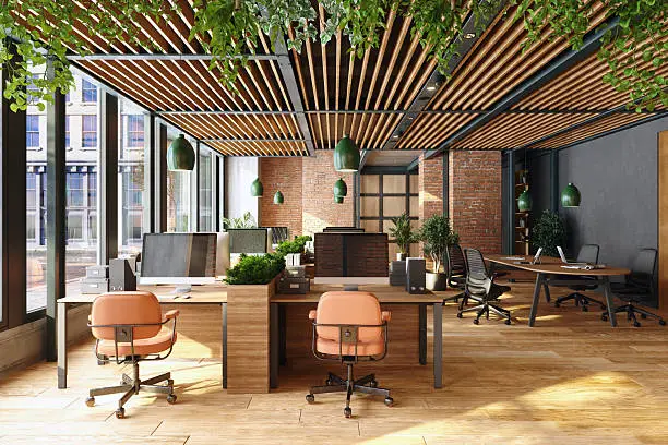 Modern office workspace with dark charcoal walls and warm wood finishes by a painter in Kansas City, MO.