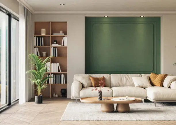 Living room with a rich green accent wall, neutral painted finishes, and detailed trim by an interior painter in Kansas City, MO.
